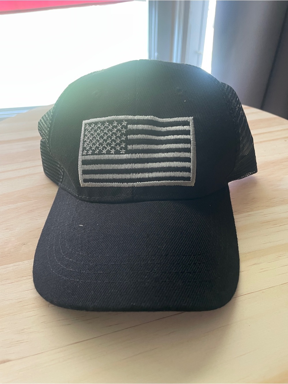 NWOT Black Trucker Hat with Embroidered American Flag Patch